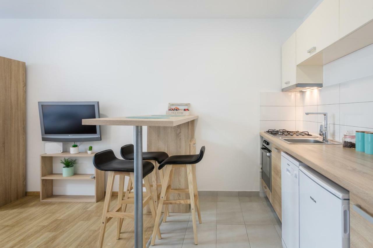 Apartmani Mursa โอซีเยก ภายนอก รูปภาพ